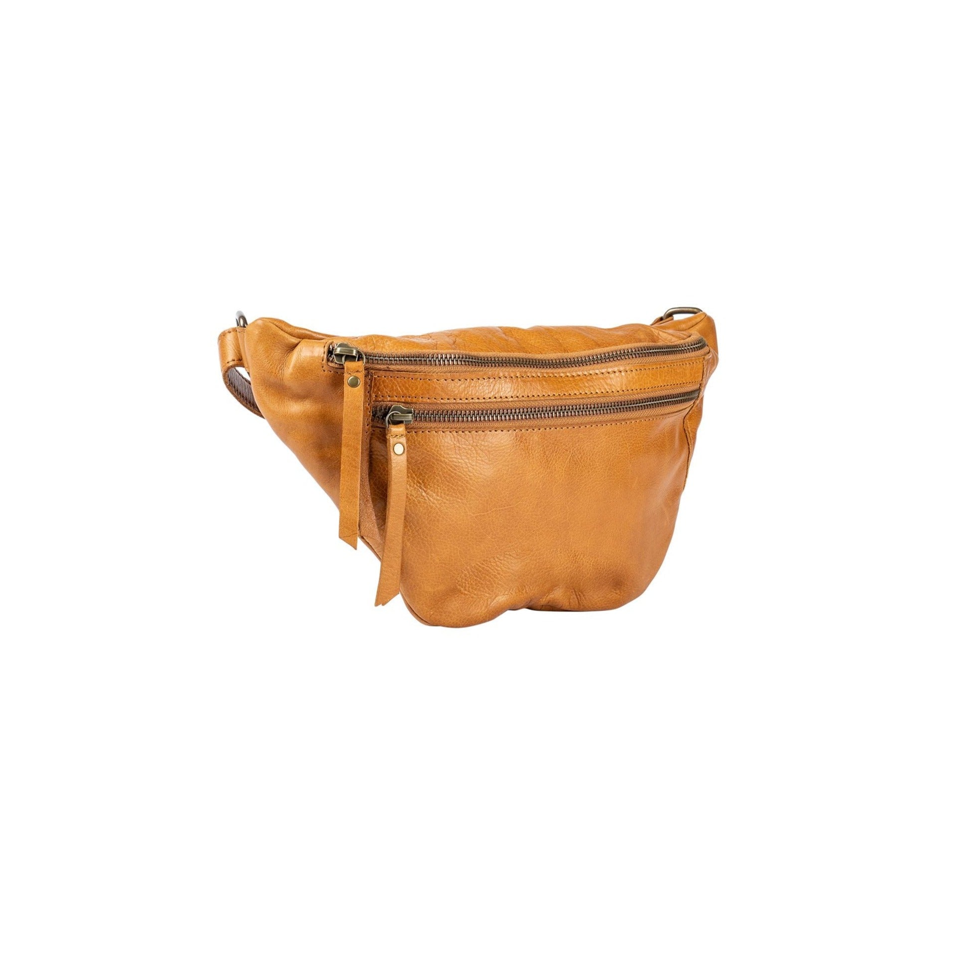 Det er den perfekte lille bumbag.. Når man ikke rigtigt har brug for en taske, men alligevel lige skal have de mest nødvendige ting med såsom nøgler, pung og telefon. Så slynger man den bare over skulderen og hænderne er fri - helt perfekt til en dag på farten. FAUST I FARVEN BURNED TAN
