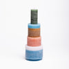  CANDL STACK 06 i farven 'Multicolor' indeholder 1 stak af 6 moduler i forskellige dimensioner og farver - Grøn, brun, lyserød, hvid og blå.
