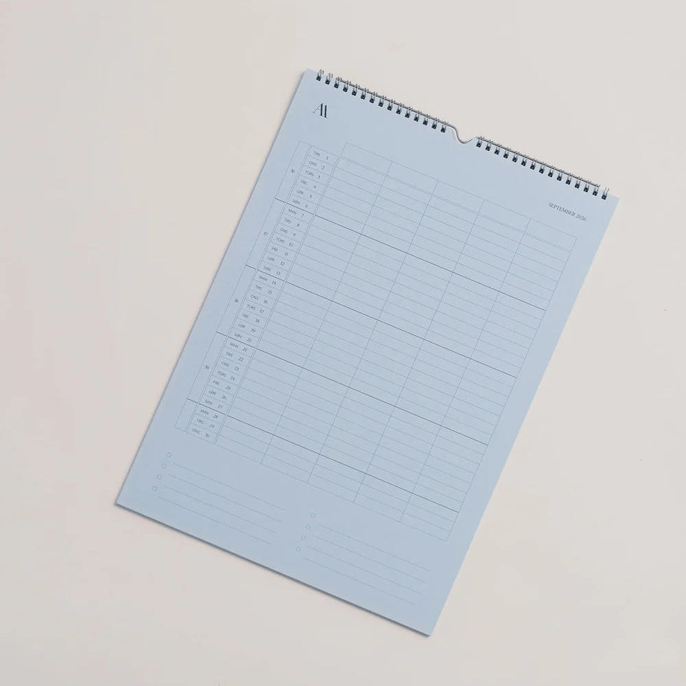 Atelier Aarhus vægkalender 2026. Siderne er i forskellige farver