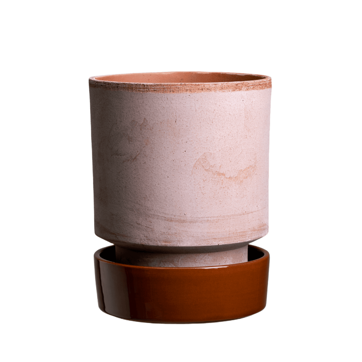 Fin glaseret underskål i farven rusty red, fra The Hoff Collection af Bergs Potter - her er den sammensat med en lyserød potte