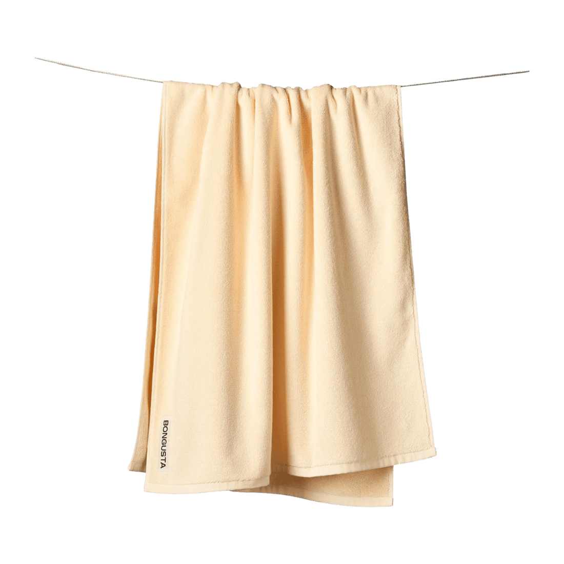 En pastelfarvet gul håndklæde fra Bongusta