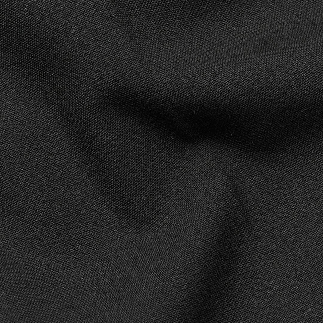 Et par sorte stilrene klassiske bukser i en uldblanding fra Five Units - close up af stoffet