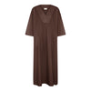 Palma er en lang, enkel kjole med V-udskæring fortil og vide kimonoærmer. Kjolen har to sidelommer. Denne er i en brun farve