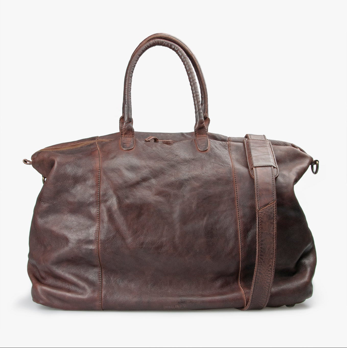 En lækker stor og brun rejsetaske fra MONTANA Est. 1957 i mørkebrun læder