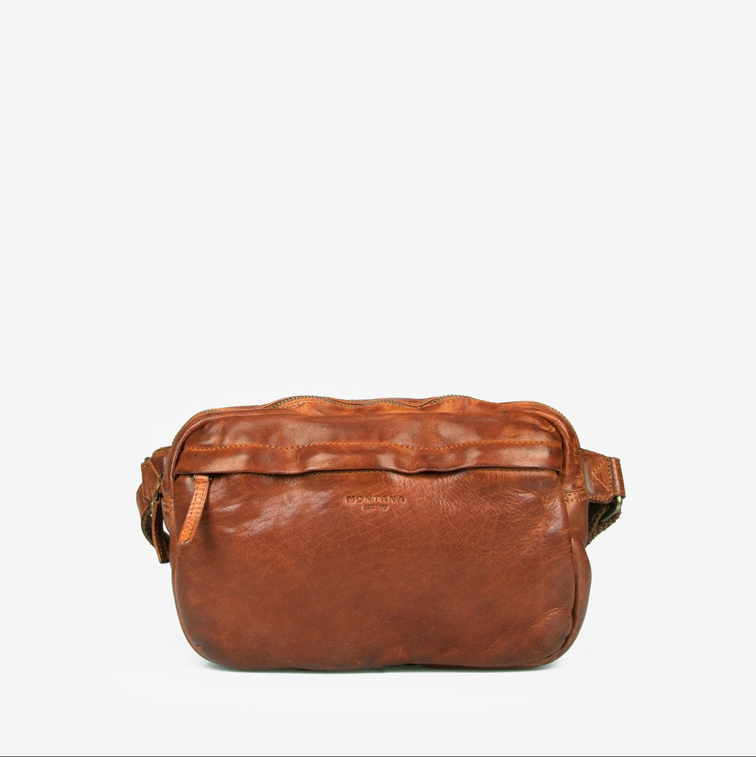 Akron tasken fra MONTANT EST. 1957 er en lækker crossbody taske i en fin lysebrun læder