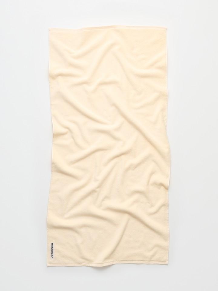 En pastelfarvet gul håndklæde fra Bongusta