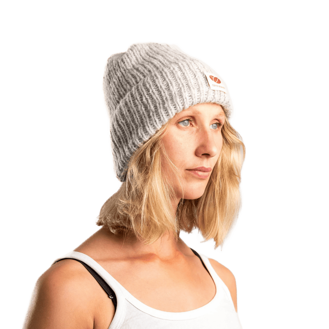 Varm ørene med denne lysegrå hue fra Coffee Beanies i alpakauld