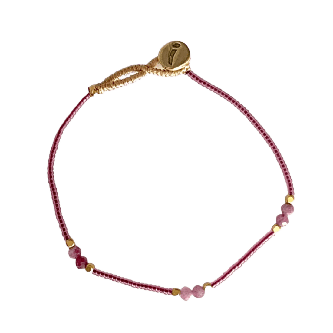 Lyserød perlearmbånd fra IBU Jewels - lavet på Bali