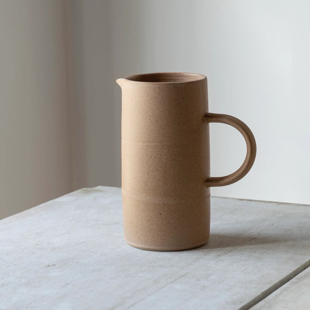 Brun kande fra Julie Damhus