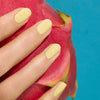 En vegansk neglelak fra Manucurist Paris i farven 'Mimosa' som er en pastel gul neglelak