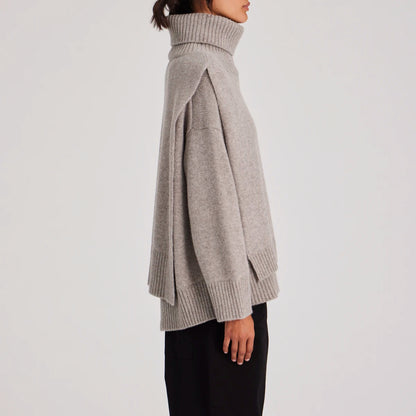 Michelle er en lækker halsedisse / neck piece i 100% lammeuld/lambswool og i en fin beige farve