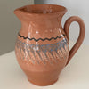 Rumænsk Keramik Kande #2. Den er brun glasseret med en brun glassering indeni 