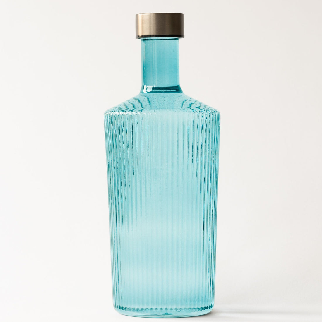 vandflaske i farvet glas. Denne er i farven &