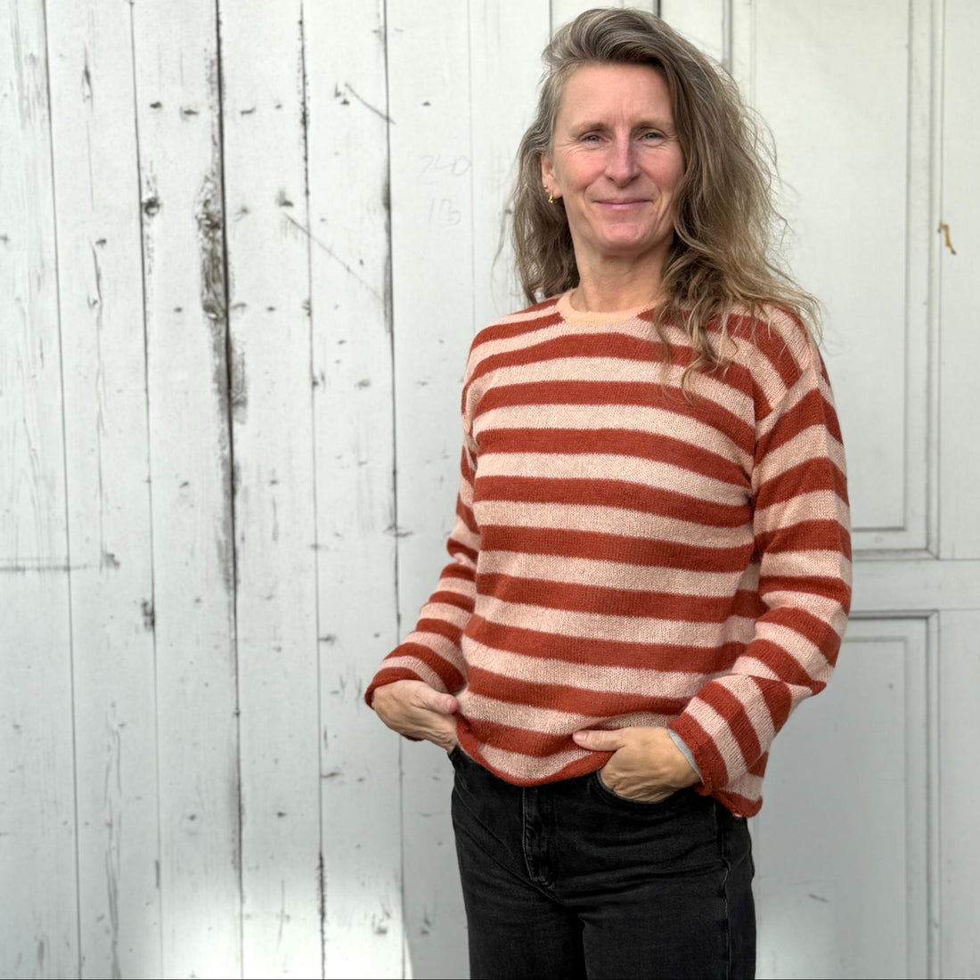 Stribet mohair strik fra det italienske mærke crossley - trøjen er i rosa farver og er perfekt til overgangstiden