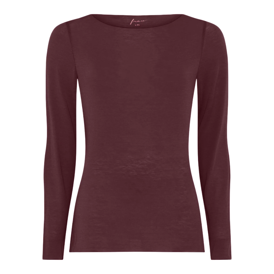 Lima er en langærmet bluse md boatneck udskæring i et lækkert modalmix fra FRAU. Denne er i en vinrød farve