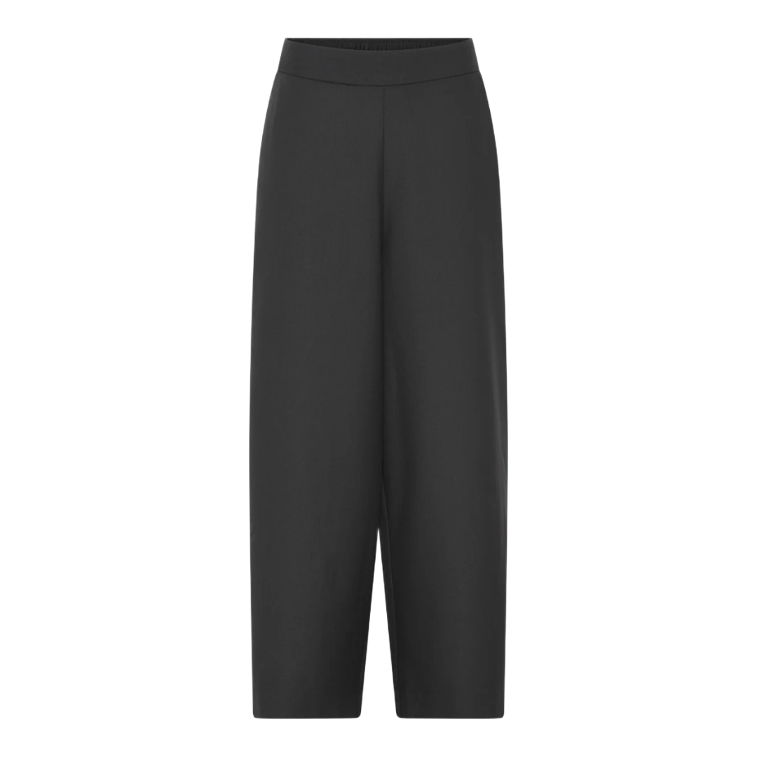 New Copenhagen bukser fra FRAU er med fast linning foran og elastik bagpå - brede i buksebenene. Disse er i farven &