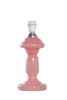 Petro 1, fra den danske virksomhed Pink Rose, er en klassisk glaslampe. Den er mundblæst, og denne farve 'rosa opal' er i en fin lyserød farve.