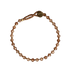 Ibu Jewels armbånd med runde brune perler og små gyldne detaljer