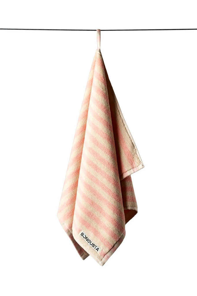 naram håndklæde i svag lyserød og creme farvet striber - gæstehåndklæde