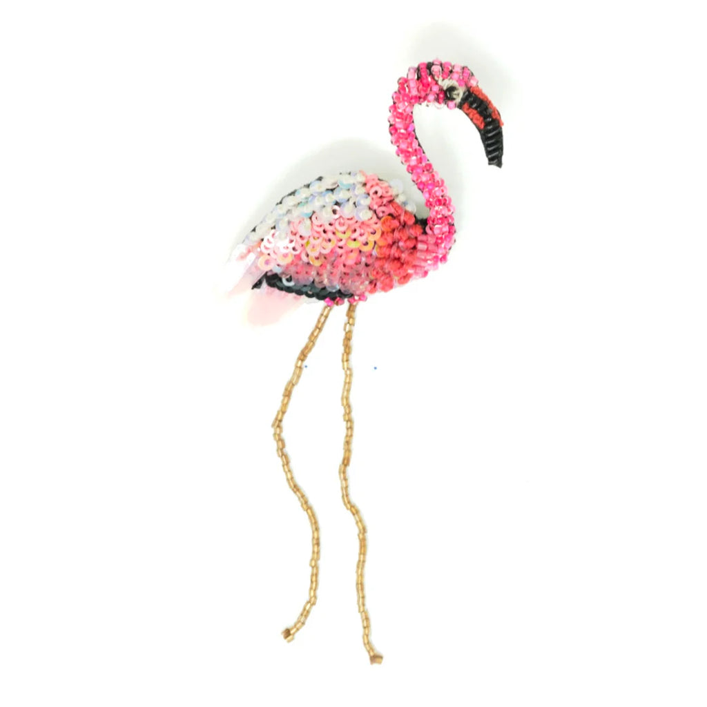 broche fra trovelore af en pink flamingo