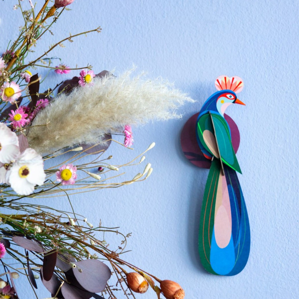 Blue wall art bird, studio roof